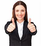 Young businesswoman with thumbs up against a white background