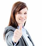 Nice businesswoman doing a thumb-up against a white background