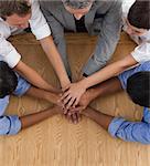 Close-up of an International business team with hands together in a meeting