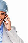 Close-up of an architect with a hardhat on phone isolated on a white background