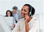 Positive business partners with headset on working in a call center