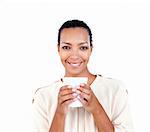 Charming businesswoman holding a drinking cup against a white background