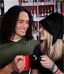 Interracial couple together at a coffee house