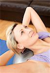 Portrait of a beautiful woman doing exercice at home