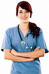 Stock image of female healthcare worker standing with arms crossed over white background
