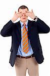 businessman making the see no evil gesture over white
