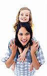 Happy mother giving her little girl piggyback ride against a white background