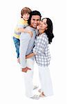 Joyful family hugging each other against a white background