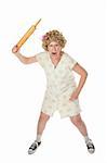 Housewife on white background wielding a rolling pin