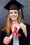 Portrait of teenage Girl Celebrating Graduation in the class