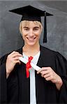 Portrait of teen Guy Celebrating Graduation in the class