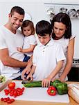 Cheerful family cooking together in the kitchen