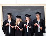 Happy group of people celebrating after Graduation