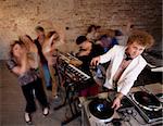 DJ changing records at a 1970s Disco Music Party