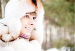 close up winter portrait of young and beautiful natural looking woman in casual clothes