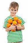 Boy holding oranges isolated on white background