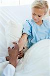 Patient getting a vaccine in a hospital