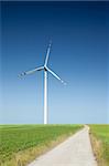 wind turbine and empty country road