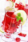 Refreshing summer ice tea or lemonade with fresh fruits