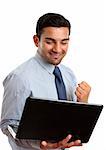 A happy excited business man with holding a laptop and showing a fist of success, or victory.  White background.