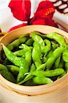 Edamame soybeans in bamboo steamer basket