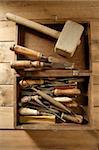 carpenter artist wooden craftman toolbox over wood background