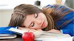 Young girl sleeping in living room at home