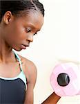 Woman doing fitness against white background