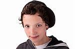 Cute boy, with a cap, smiling, isolated on white background. Studio shot.