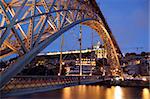 Dom Luis I bridge illuminated at night. Porto, Portugal