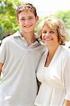 Portrait of a happy old woman with adorable grandson