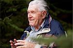 A grandfather telling a story in the forest