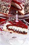 Delicious stracciatella birthday cake with candle