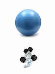 Hand weights and a fitball isolated against a white background