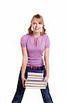 Schoolgirl is holding the stack of book on white background.