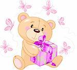 Cute Teddy Bear sitting with pink gift box