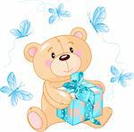 Cute Teddy Bear sitting with blue gift box