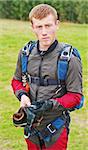 Portrait of the parachutist in overalls on airdrome