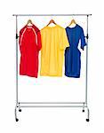 Colored shirts on a Clothes Rack isolated on white background