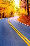 Winding road through fall forest in Appalachian Mountains