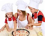 Woman making pizza with her kids at home - isolated