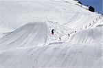 Snowboard jumping. Ski resort Dombay. Caucasus Mountains.