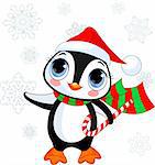 Cute Christmas penguin with Santa?s hat and scarf