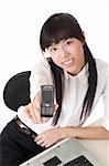 Happy smiling business woman showing her cellphone, closeup portrait in office.