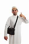 Happy ethnic arab man showing a thumbs up hand sign.  White background.