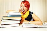 beautiful caucasian female student with books