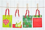 Holiday Gift Bags on a Clothesline.  Holiday Concept.