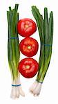 Fresh Green Onions with Tomatoes Isolated on White with a Clipping Path.