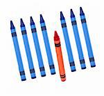 A Single Orange Crayon with Several blue Crayons for Diversity, and Teamwork Concepts.  Isolated on White with a Clipping Path.