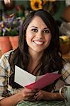 Beautiful Latina Woman at Table in Kitchen Greeting Card